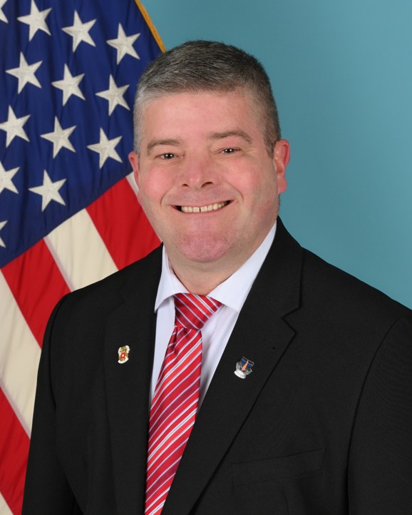 Mr. Christopher J. Powell 